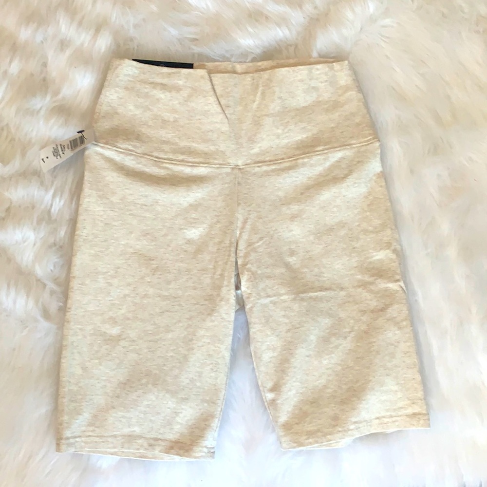 High rise TNA biker short in Cream. Size M 9”